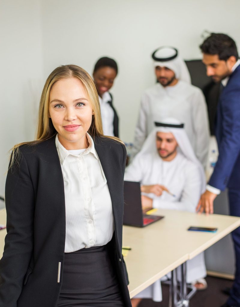 Multiracial group of business people having a meeting in a office - Teamwork in the office, business meeting in the UAE